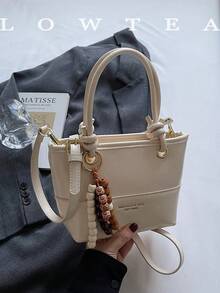 low tea 1个低茶色纯色PU皮手提包，女士复古时尚水桶包，顶部双提手设计，拉链封口，可拆卸可调节肩带，适合旅行、购物、约会、女士礼物，也适合通勤、户外活动、旅行、徒步等场合。 - 白色 - 查看 5