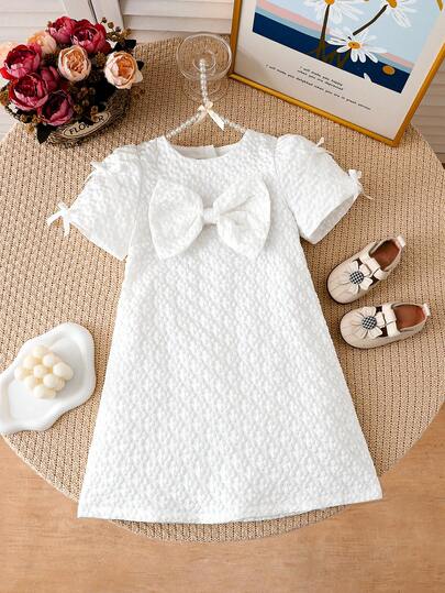 This Elegant Textured Fabric Round Neck Puff Sleeve Pearl Embellished High-Gloss Dress Is Designed For Young Girls, In White, New For Summer, With A Zipper Design For Easy Wear And Removal, Suitable For Parties, Holidays, Festivals, Weddings, Casual Dining, Afternoon Tea And Other Occasions.