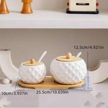 一套陶瓷厨房储物罐，1个大罐1个小罐，配有竹制托盘和陶瓷勺，北欧简约日式风格，白色陶瓷质感，高端品质，菱形、波浪、鸟巢图案，适用于酒店、餐厅、家庭厨房用品、节日、聚会、斋月、春节厨房、客厅收纳装饰，圆形竹盖，可存放香料、胡椒、盐、糖等调味料。 - 白色 - 查看 14