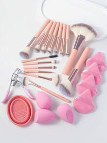 这款24件套的Eid节日化妆刷套装包含15支柔软的化妆刷，例如散粉刷、腮红刷、轮廓刷、高光刷、粉底刷、鼻影刷、眼影刷、眉刷、唇刷和细节刷；此外还包含3个液体化妆蛋、4个三角粉扑、1个睫毛夹和1个刷子清洁碗。适合初学者、专业化妆师和新手美妆爱好者使用。 - 粉色 - 查看 10