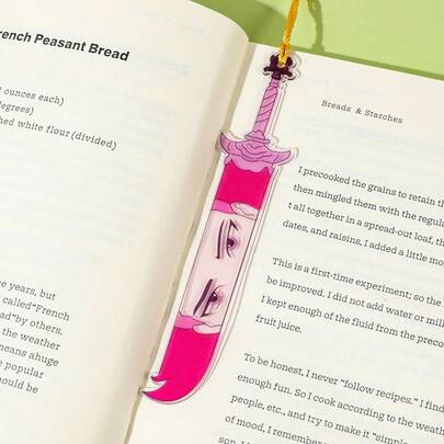 KPOP Sword-Shaped Acrylic Bookmarks: Purple, Red And Blue Colors Correspond To Core Members And Zoe Respectively. The Sword Blade Shape Features A Half-Face Character Illustration, With Golden Tassels Adding An Touch. This Is A Practical Stationery Bookmark For Students To Mark Their Reading Progress.
