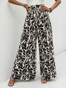 女士波西米亚风花卉叶子印花高腰褶皱阔腿沙滩裤，适合度假春季穿着，黑色 - 黑色 - 查看 2