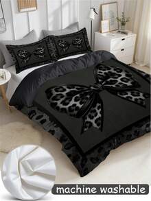 3件套豹纹蝴蝶结印花被套套装（1个被套+2个枕套，不含被芯），采用性感迷人的豹纹印花设计，柔软亲肤，舒缓视觉疲劳，四季皆宜，拉链封口，适用于酒店、卧室、客房和宿舍的床上用品装饰，低过敏性，易于打理，时尚轻盈，透气性好，低过敏性，易于护理，简约现代风格。 - 黑色 - 查看 10