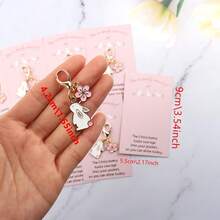 5个/10个可爱樱花兔钥匙扣，带口袋拥抱鼓励卡 | 适合学生/上班族/朋友 | 完美适用于复活节/生日/考试/毕业典礼/日常鼓励/节日祝福/异地关怀 | 金属材质 - 彩色 - 查看 8