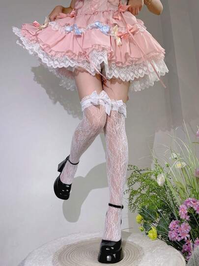 1双女士白色蕾丝蝴蝶结过膝长筒袜