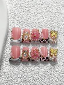 10件套奢华网红风亚克力美甲套装，包含亚克力美甲贴纸、金色镂空水钻装饰、金色蝴蝶、手工五瓣渐变粉色花朵、黑色豹纹、树枝美甲装饰，是送给女性和女孩的理想美甲礼物，套装内含美甲工具和美甲用品。 - 彩色 - 查看 2