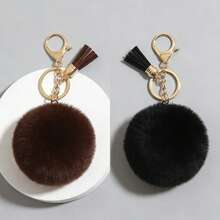 Bộ móc khóa tua rua mềm mại đáng yêu này là một món quà nhỏ bất ngờ dành cho chính bạn hoặc bạn bè. Chất liệu bông xù mềm mại tạo cảm giác thoải mái, và những chiếc tua rua sống động làm tăng thêm vẻ tươi tắn. Bạn có thể dễ dàng móc chúng vào chìa khóa để tránh bị mất, đồng thời làm cho túi xách của bạn thêm phần bắt mắt. Vô cùng tiện lợi cho việc sử dụng hàng ngày. - Cà phê nâu - Xem 11