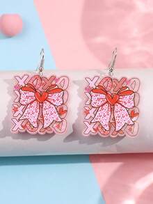 一对独特的爱心蝴蝶结XOXO亚克力吊坠耳环，时尚可爱，适合女性日常佩戴、派对、通勤、度假等场合。 - 彩色 - 查看 2