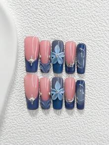 Bộ dụng cụ làm móng nghệ thuật phong cách nghỉ dưỡng tươi mới và thoải mái gồm 10 món, bao gồm miếng dán móng acrylic, hoa 5 cánh màu xanh gradient thủ công, họa tiết ngôi sao bạc, họa tiết sóng bạc trắng vẽ tay, sơn móng tay màu xanh dương, cùng dụng cụ làm móng (1 miếng dán gel + 1 dũa móng) với 3 kích cỡ: hình hạnh nhân, hình mỏ vịt, hình quan tài. - Nhiều màu - Xem 13