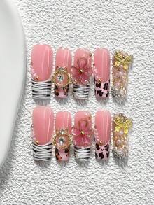 10件套奢华网红风亚克力美甲套装，包含亚克力美甲贴纸、金色镂空水钻装饰、金色蝴蝶、手工五瓣渐变粉色花朵、黑色豹纹、树枝美甲装饰，是送给女性和女孩的理想美甲礼物，套装内含美甲工具和美甲用品。 - 彩色 - 查看 11