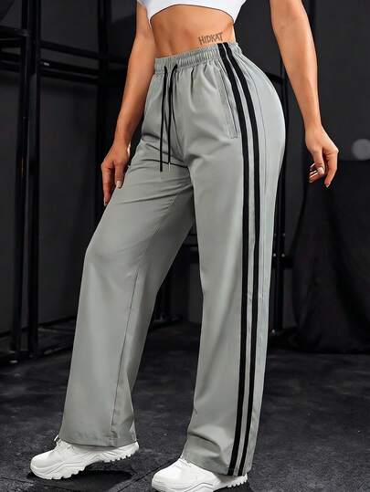 Pantalones anchos de estilo americano casual y de moda con rayas para mujer, con cordón en la cintura, corte holgado, elegante y minimalista, adecuados para deportes al aire uso diario