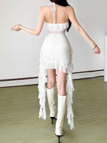 Vestido mini ajustado con escote halter, espalda descubierta, tela de malla transparente, volantes en el bajo y adornos con flecos de YeonC - Blanco - Ver 2