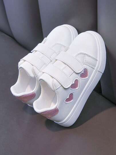 1 par de nuevas zapatillas de lona con decoración de corazón para niñas, antideslizantes, zapatos blancos pequeños casuales, zapatos versátiles de moda para niños, adecuados para primavera, verano, otoño e invierno