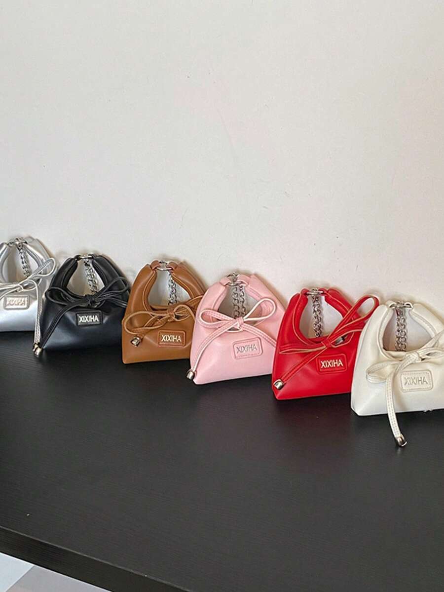 1个青少年斜挎包，便携式马卡龙色，外出必备，包含耳机盒、口红盒、零钱包 - 蝴蝶結 - 查看 1