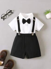 BrownBark 两件套男婴绅士风套装 - 领结装饰休闲短袖衬衫和背带短裤，适合生日派对、正式场合、婚礼、洗礼、一周岁生日庆祝、日常穿着 - 黑色 - 查看 1
