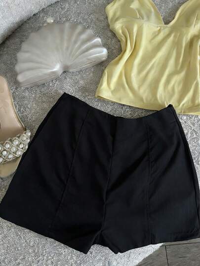 Pantalones cortos rectos de mujer de color negro tejidos con detalle de cremallera, sin estiramiento, longitud corta para verano