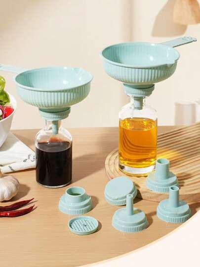 7-In-1 Multifunctional Kitchen Funnel Set. Includes 7 Different Sized Funnel Components Made Of PP Material, With Matching Funnels And Bases To Fit Various Bottle Openings. Suitable For Portioning Condiments (Soy Sauce, Vinegar, Etc.), Liquids (Cooking Oil, Beverages, Etc.), And Grains (Rice, Flour, Etc.) To Avoid Spills. Applicable For Home Kitchen, Food Processing, Outdoor Camping, And More.
