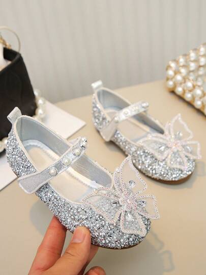 Zapatos planos para bebé niña con lazo, cristales y perlas