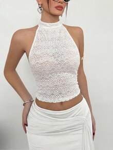 Faeriesty 白色个性露背蕾丝短款上衣 - 无袖透视网纱女性化街头风，打造大胆日常造型 | 花卉刺绣，修身剪裁，百搭叠穿单品 - 完美适用于街拍、休闲聚会、街头穿搭、夏季音乐节 - 白色 - 查看 2