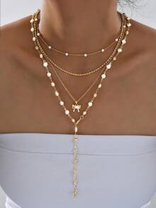 4件套复古朋克波西米亚风人造珍珠蝴蝶结Y型项链套装，优雅设计，适合女性日常、通勤、派对、约会等场合，也是送给女友或母亲的礼物。 - 金黃色 - 查看 2