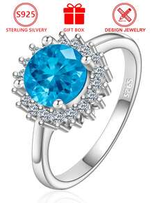 Anel feminino geométrico em prata de lei S925, com zircônia cúbica azul redonda cravejada em pavé, tamanho ajustável, ideal para uso diário ou para presentear, perfeito para noivado. Acompanha caixa para presente. - Prata - Ver 2
