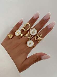 Set de 7 piezas de anillos con diseños geométricos exagerados de temas marinos - concha, estrella de mar, vieira, anillos apilables metálicos, lujosos, adecuados para boda, fiesta, playa, estilo casual, mujeres, parejas, vacaciones, regalo de cumpleaños - Dorado - Ver 3