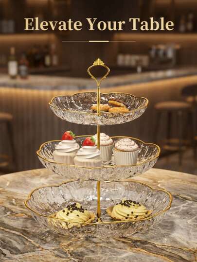 1件装多层轻奢水果盘（中号透明金，三层透明）：精致镂空设计，稳固防滑，适合摆放在客厅茶几上，盛放水果、干果、零食等。是日常家庭娱乐、朋友周末聚会以及提升客厅格调的理想之选。