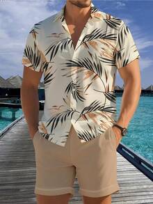 Bộ đồ nam phong cách Hawaii gồm áo thun in hình lá cọ và quần short có dây rút, thoải mái và năng động. - Nhiều màu - Xem 1