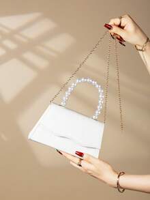 REMANLAND Chiếc ví cầm tay đính ngọc trai thanh lịch và quyến rũ, thiết kế nắp gập tinh tế, phù hợp làm ví dự tiệc/cocktail, ví dạ hội, ví đeo vai/đeo chéo, với dây đeo bằng kim loại, hoàn hảo cho phụ nữ tham dự các bữa tiệc, đám cưới, dạ hội và các sự kiện trang trọng, một lựa chọn lý tưởng cho các cô gái thích tiệc tùng và các quý cô, cũng là một món quà tuyệt vời dành cho phái nữ. - Xem 4