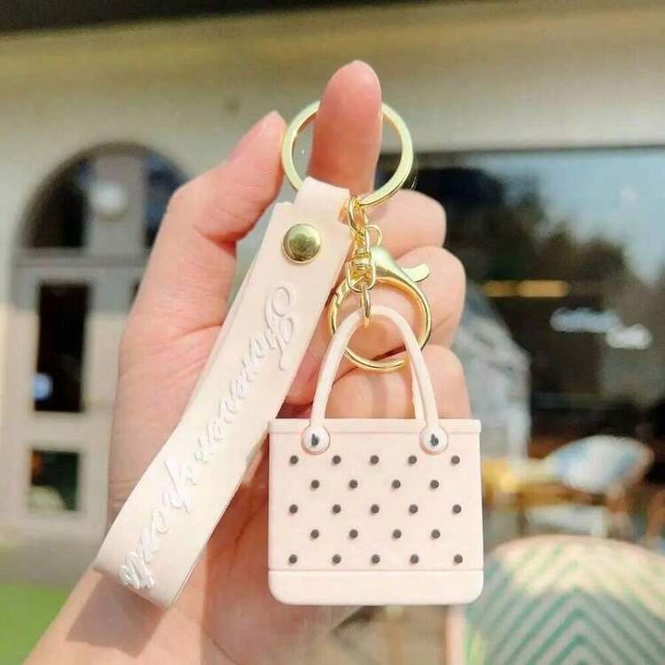 Lindo llavero con diseño de agujero de playa, llavero de coche mini portátil y simple de silicona suave con adorno colgante de cesta grande de estilo marítimo - Beige - Añade 8