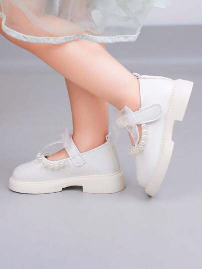 1双女童珍珠蝴蝶结装饰公主平底鞋，软底防滑婴儿休闲皮鞋，时尚百搭芭蕾平底鞋，适合春、夏、秋、冬四季穿着