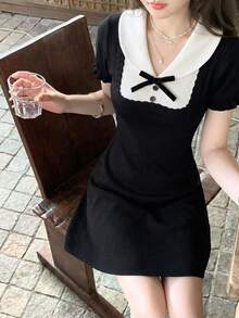 夏季黑白撞色针织迷你连衣裙 - 优雅纯正的Yurty甜美休闲学院风街头Y2K短袖彼得潘领蝴蝶结装饰荷叶边袖口修身A字女装连衣裙及上衣 | 适合年轻女士、甜美女孩、Y2K女孩和性感女孩，完美适用于情人节/妇女节/母亲节/休闲聚会/海滩度假/派对聚会/返校季/婚礼季/音乐节/2026春季学院风针织连衣裙 - 黑色 - 查看 1