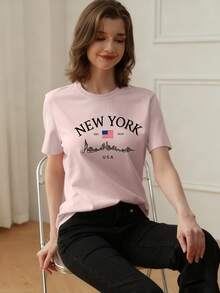 Camiseta de mujer de verano de ajuste holgado con cuello redondo y manga corta, con estampado de eslogan simple, estilo casual de vacaciones. Blusa de moda apta para uso diario y de vacaciones. - Rosa - Ver 2