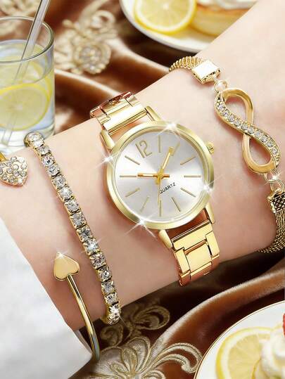 4 件套华丽优雅女士石英表套装，配金色配件（包括金色金属表带石英表，银色表盘，简约刻度；水钻手链；心形开口手镯；无限符号水钻手链）。