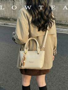 low tea 1个低茶色纯色PU皮手提包，女士复古时尚水桶包，顶部双提手设计，拉链封口，可拆卸可调节肩带，适合旅行、购物、约会、女士礼物，也适合通勤、户外活动、旅行、徒步等场合。 - 白色 - 查看 7