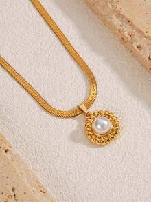 هذا القلادة اللؤلؤية الذهبية، المصنوعة من الفولاذ المقاوم للصدأ المطلي بالذهب عيار 18 وتم تصميمها بسلسلة عظم الثعبان الأنيقة، فهي فاخرة وراقية وأنيقة وجذابة، مثالية للسيدات في جميع المناسبات. - الذهبي - مشاهدة 11