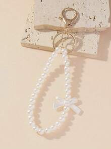 1pc Women's Elegant Bow & Faux Pearl Beaded Keychain, Fashionable Minimalist Beaded Birthday/Holiday Gift, Cute Phone Strap & Bag Charm - Bow - View 1