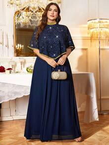 Đầm maxi sang trọng với họa tiết ren đính kim sa vàng, viền voan, thích hợp cho khách dự đám cưới, tiệc trang trọng, sinh nhật, lễ tốt nghiệp, dạ tiệc và các dịp khác. Mùa xuân - Màu xanh hải quân - Xem 5