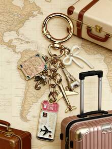 1个优雅的粉色、白色和蓝色旅行钥匙扣吊坠，包含蝴蝶结、飞机、包包、护照、埃菲尔铁塔和水滴形状，可作为DIY珠宝配件、手提包挂饰、背包装饰、单肩包配件、多功能包包装饰和汽车装饰。 - 彩色 - 查看 5