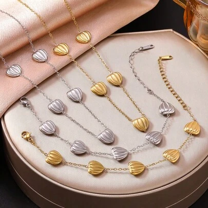 Nuevo conjunto de pulsera y collar de la serie Océano de acero de titanio, joyas de lujo de oro de 18K y acero inoxidable ligeras para mujer