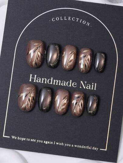 10pcs/Set Handmade Short Oval Nail Pieces In Y2K Brown Style & Hand Painted Gradient Shimmer Cat Eye & Hand Painted Green Leaf Print Design Nail Decoration. 1 Piece Of Jelly Gel And 1 Nail File. Perfect For Daily Life As Well As Coachella Music Festival Party Outfits, Press On Nails And Nail Care Products.