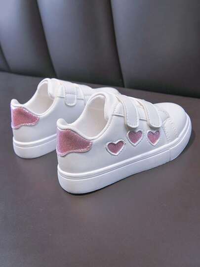 1 par de nuevas zapatillas de lona con decoración de corazón para niñas, antideslizantes, zapatos blancos pequeños casuales, zapatos versátiles de moda para niños, adecuados para primavera, verano, otoño e invierno