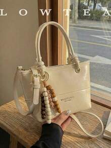 low tea 1个低茶色纯色PU皮手提包，女士复古时尚水桶包，顶部双提手设计，拉链封口，可拆卸可调节肩带，适合旅行、购物、约会、女士礼物，也适合通勤、户外活动、旅行、徒步等场合。 - 白色 - 查看 9