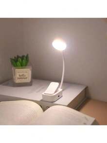4-LED White Clip-On Eyecare Reading Lamp With Rechargeable Design, Featuring 3 Color Temperatures And Stepless Dimming For Comfortable Lighting. Soft And Gentle Light Helps Reduce Eye Strain, Ideal For Night Reading And Studying. Built-In 400mAh Battery Provides Stable Use Time. Lightweight And Portable With Clip-On Design, Easily Attaches To Books, Desks, Bedside Tables, Or Laptops. Suitable For Reading, Study, Office, Dorm, Or Travel Use. A Practical And Compact Lighting Accessory For Daily Use And A Thoughtful Gift Choice. - trắng - Xem 3