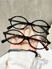 一副椭圆形经典时尚优雅透明眼镜，适合日常生活、办公室阅读、看电视、玩游戏、打电话，是女士商务休闲时尚配饰，适合所有脸型。 - 彩色 - 查看 9