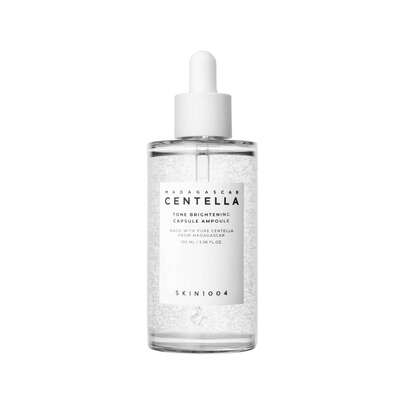  SKIN1004 Sérum Facial lluminador Madagascar CentellaTone Brightening Capsule Ampoule Jumbo100ML,Tónico ligero y potente, infundido conMadeWhite, un ingrediente hecho de extractosde centella asiática de Madagascar y niacinamidapara beneficios de iluminación