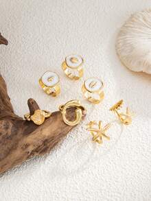 Set de 7 piezas de anillos con diseños geométricos exagerados de temas marinos - concha, estrella de mar, vieira, anillos apilables metálicos, lujosos, adecuados para boda, fiesta, playa, estilo casual, mujeres, parejas, vacaciones, regalo de cumpleaños - Dorado - Ver 7