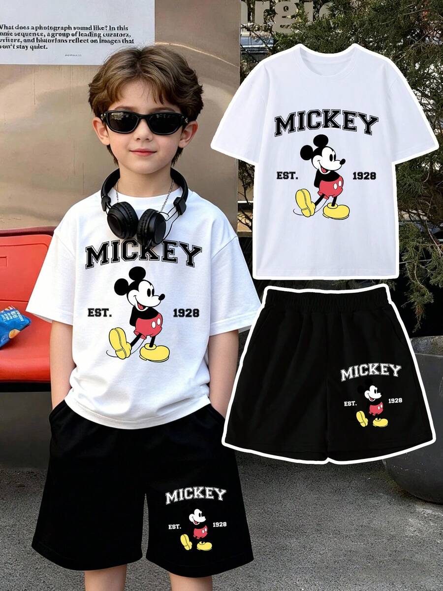 Disney Short-Sleeve T-Shirt And Shorts Summer Set Featuring Mickey Mouse Lettering On The T-Shirt And Mickey Head Print On The Shorts, Crafted From Soft, Comfortable Fabric. This Two-Piece Boys' Set Is Perfect For Spring And Summer, Offering A Cool Look Ideal For School, Shopping, Or Travel. It Also Makes A Great Gift For Young Boys. - Trắng + Đen - Xem 1