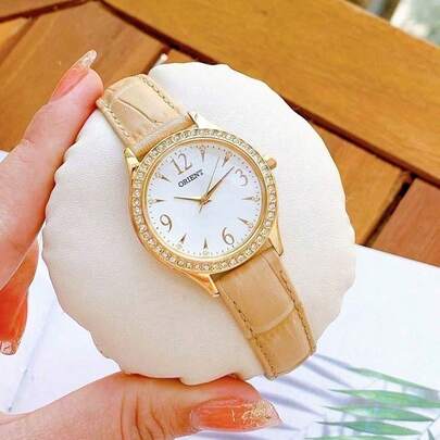 Orient Women's Luxury Gold Rhinestone Bezel Elegant Beige Leather Band Quartz Wrist Watch With Arabic Numerals FQC10006W0