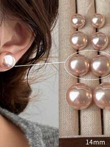 一对时尚优雅的粉色仿珍珠耳环，适合女性日常佩戴，也适合在晚宴/派对等场合佩戴，可作为生日礼物送给朋友，或作为情人节礼物。 - 粉色 - 查看 4